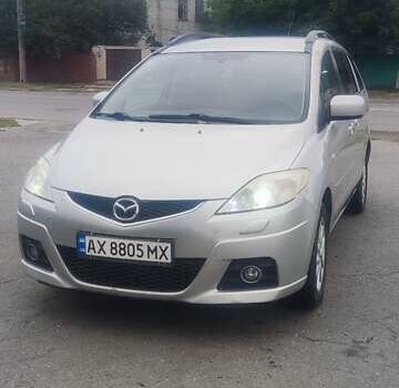 Серый Мазда 5, объемом двигателя 2 л и пробегом 277 тыс. км за 5250 $, фото 1 на Automoto.ua