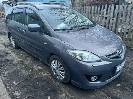 Серый Мазда 5, объемом двигателя 2 л и пробегом 312 тыс. км за 3600 $, фото 1 на Automoto.ua