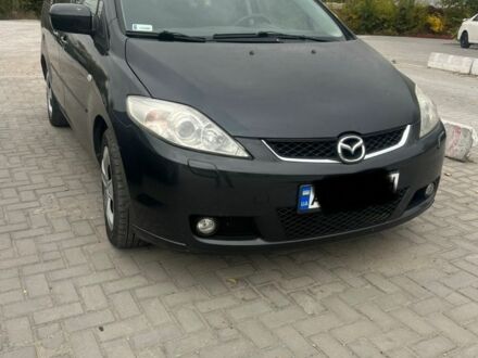Серый Мазда 5, объемом двигателя 2 л и пробегом 200 тыс. км за 3400 $, фото 1 на Automoto.ua