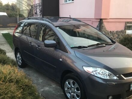 Серый Мазда 5, объемом двигателя 2 л и пробегом 165 тыс. км за 5900 $, фото 1 на Automoto.ua