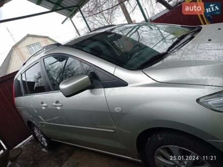 Серый Мазда 5, объемом двигателя 1.8 л и пробегом 247 тыс. км за 6550 $, фото 1 на Automoto.ua