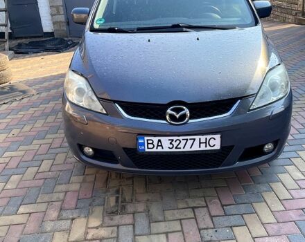 Серый Мазда 5, объемом двигателя 2 л и пробегом 253 тыс. км за 3899 $, фото 1 на Automoto.ua