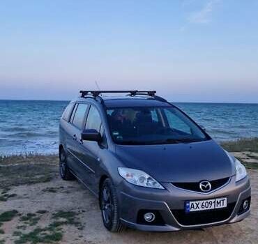 Серый Мазда 5, объемом двигателя 2 л и пробегом 290 тыс. км за 6474 $, фото 1 на Automoto.ua