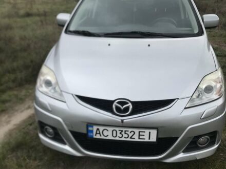 Серый Мазда 5, объемом двигателя 2 л и пробегом 213 тыс. км за 6000 $, фото 1 на Automoto.ua