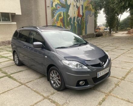 Серый Мазда 5, объемом двигателя 2 л и пробегом 269 тыс. км за 5450 $, фото 1 на Automoto.ua