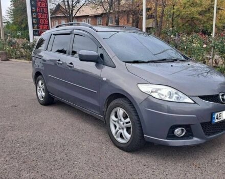 Серый Мазда 5, объемом двигателя 2 л и пробегом 300 тыс. км за 5499 $, фото 1 на Automoto.ua