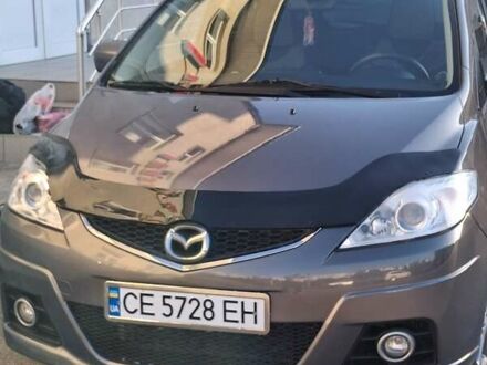 Серый Мазда 5, объемом двигателя 2 л и пробегом 270 тыс. км за 6850 $, фото 1 на Automoto.ua