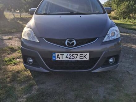 Серый Мазда 5, объемом двигателя 2 л и пробегом 247 тыс. км за 6800 $, фото 1 на Automoto.ua