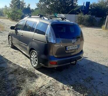 Серый Мазда 5, объемом двигателя 2 л и пробегом 220 тыс. км за 7600 $, фото 1 на Automoto.ua