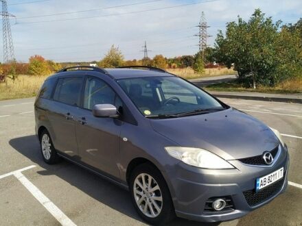 Серый Мазда 5, объемом двигателя 2 л и пробегом 206 тыс. км за 6000 $, фото 1 на Automoto.ua