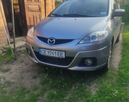 Серый Мазда 5, объемом двигателя 2 л и пробегом 216 тыс. км за 6200 $, фото 1 на Automoto.ua