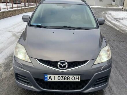 Серый Мазда 5, объемом двигателя 2 л и пробегом 250 тыс. км за 7000 $, фото 1 на Automoto.ua