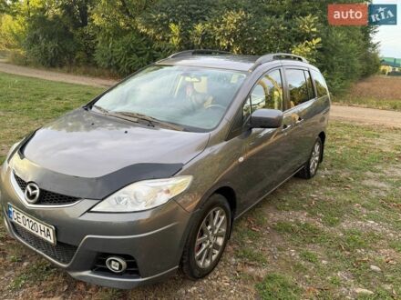 Серый Мазда 5, объемом двигателя 2 л и пробегом 285 тыс. км за 5350 $, фото 1 на Automoto.ua