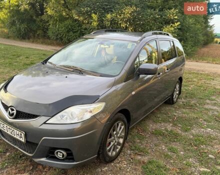 Серый Мазда 5, объемом двигателя 2 л и пробегом 285 тыс. км за 5350 $, фото 1 на Automoto.ua