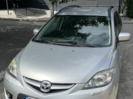 Серый Мазда 5, объемом двигателя 2 л и пробегом 180 тыс. км за 6991 $, фото 1 на Automoto.ua