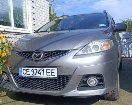Серый Мазда 5, объемом двигателя 2 л и пробегом 217 тыс. км за 5700 $, фото 1 на Automoto.ua