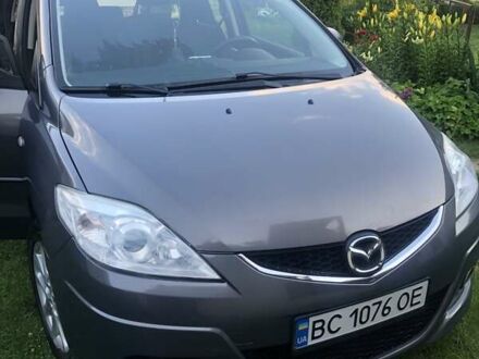 Серый Мазда 5, объемом двигателя 2 л и пробегом 215 тыс. км за 6000 $, фото 1 на Automoto.ua