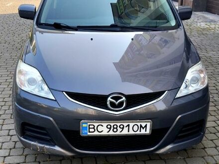 Серый Мазда 5, объемом двигателя 2 л и пробегом 250 тыс. км за 7500 $, фото 1 на Automoto.ua