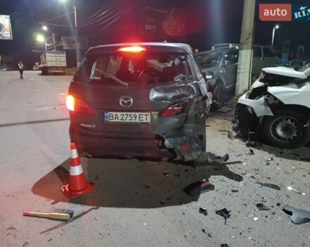 Серый Мазда 5, объемом двигателя 2 л и пробегом 250 тыс. км за 1650 $, фото 1 на Automoto.ua