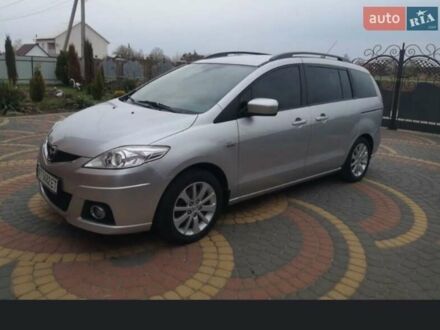 Серый Мазда 5, объемом двигателя 2 л и пробегом 283 тыс. км за 7700 $, фото 1 на Automoto.ua
