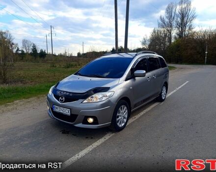 Серый Мазда 5, объемом двигателя 2 л и пробегом 224 тыс. км за 6850 $, фото 1 на Automoto.ua