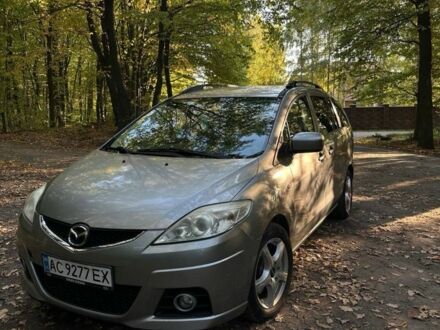 Серый Мазда 5, объемом двигателя 2 л и пробегом 270 тыс. км за 6623 $, фото 1 на Automoto.ua