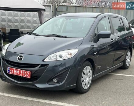 Серый Мазда 5, объемом двигателя 2 л и пробегом 258 тыс. км за 11000 $, фото 1 на Automoto.ua
