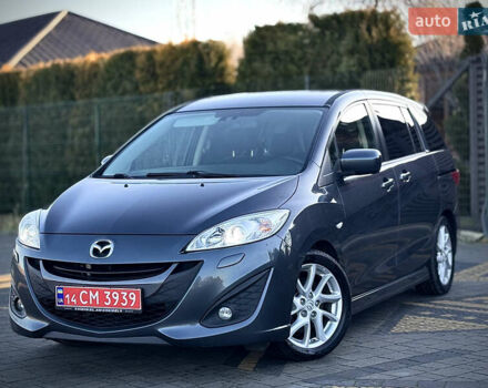 Серый Мазда 5, объемом двигателя 1.6 л и пробегом 261 тыс. км за 7800 $, фото 1 на Automoto.ua