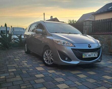 Серый Мазда 5, объемом двигателя 2 л и пробегом 150 тыс. км за 7500 $, фото 1 на Automoto.ua