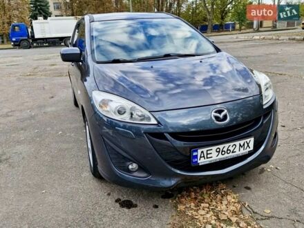 Серый Мазда 5, объемом двигателя 2 л и пробегом 211 тыс. км за 7700 $, фото 1 на Automoto.ua