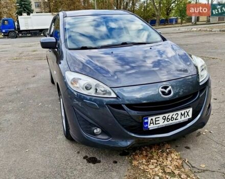 Серый Мазда 5, объемом двигателя 2 л и пробегом 211 тыс. км за 7700 $, фото 1 на Automoto.ua