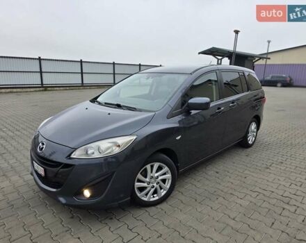 Серый Мазда 5, объемом двигателя 2 л и пробегом 280 тыс. км за 6650 $, фото 1 на Automoto.ua