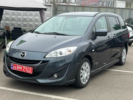 Серый Мазда 5, объемом двигателя 2 л и пробегом 258 тыс. км за 11000 $, фото 1 на Automoto.ua