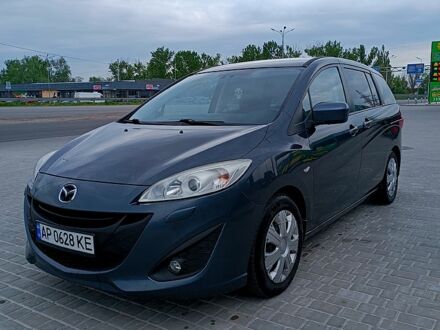 Серый Мазда 5, объемом двигателя 2 л и пробегом 210 тыс. км за 7800 $, фото 1 на Automoto.ua