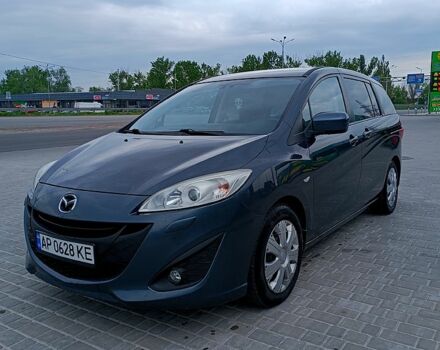 Серый Мазда 5, объемом двигателя 2 л и пробегом 210 тыс. км за 7800 $, фото 1 на Automoto.ua