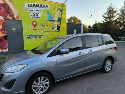 Серый Мазда 5, объемом двигателя 1.6 л и пробегом 235 тыс. км за 6999 $, фото 1 на Automoto.ua