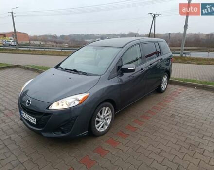 Серый Мазда 5, объемом двигателя 2.49 л и пробегом 244 тыс. км за 7000 $, фото 1 на Automoto.ua