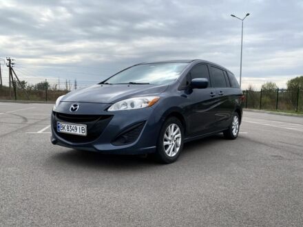 Серый Мазда 5, объемом двигателя 2.5 л и пробегом 317 тыс. км за 6999 $, фото 1 на Automoto.ua