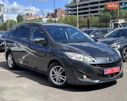 Серый Мазда 5, объемом двигателя 2 л и пробегом 196 тыс. км за 11000 $, фото 1 на Automoto.ua
