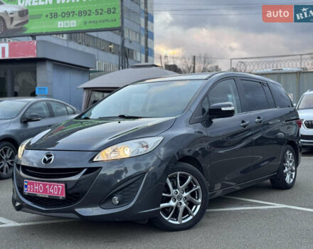 Серый Мазда 5, объемом двигателя 2 л и пробегом 181 тыс. км за 11000 $, фото 1 на Automoto.ua