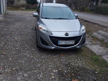 Серый Мазда 5, объемом двигателя 2.49 л и пробегом 145 тыс. км за 9000 $, фото 1 на Automoto.ua