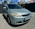 Синий Мазда 5, объемом двигателя 2 л и пробегом 250 тыс. км за 3850 $, фото 1 на Automoto.ua