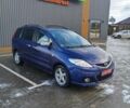 Синій Мазда 5, об'ємом двигуна 2 л та пробігом 239 тис. км за 4700 $, фото 1 на Automoto.ua