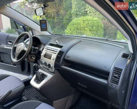 Синій Мазда 5, об'ємом двигуна 2 л та пробігом 258 тис. км за 4200 $, фото 33 на Automoto.ua
