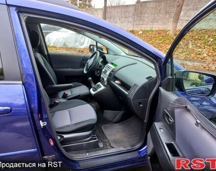 Синий Мазда 5, объемом двигателя 1.8 л и пробегом 300 тыс. км за 5400 $, фото 7 на Automoto.ua
