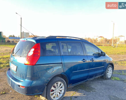 Синий Мазда 5, объемом двигателя 2 л и пробегом 215 тыс. км за 5500 $, фото 4 на Automoto.ua