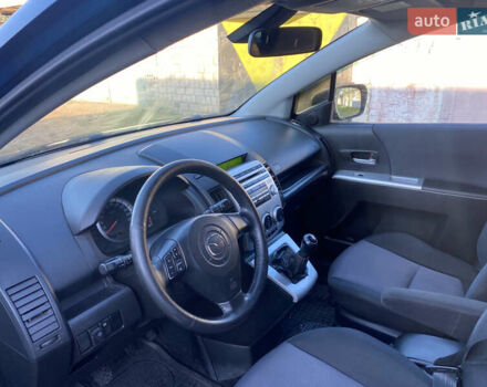 Синий Мазда 5, объемом двигателя 2 л и пробегом 260 тыс. км за 3900 $, фото 4 на Automoto.ua