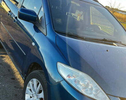 Синий Мазда 5, объемом двигателя 2 л и пробегом 215 тыс. км за 5500 $, фото 6 на Automoto.ua