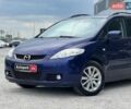 Синий Мазда 5, объемом двигателя 1.8 л и пробегом 317 тыс. км за 3590 $, фото 1 на Automoto.ua