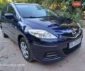 Синий Мазда 5, объемом двигателя 2 л и пробегом 200 тыс. км за 5350 $, фото 1 на Automoto.ua